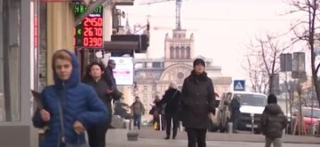 обмін валют курс долара гривня люди українці